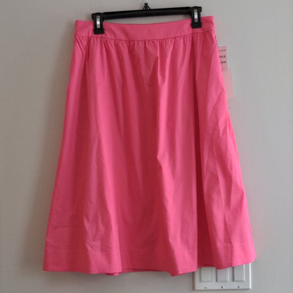 Pink midi a-line skirt. NWT.